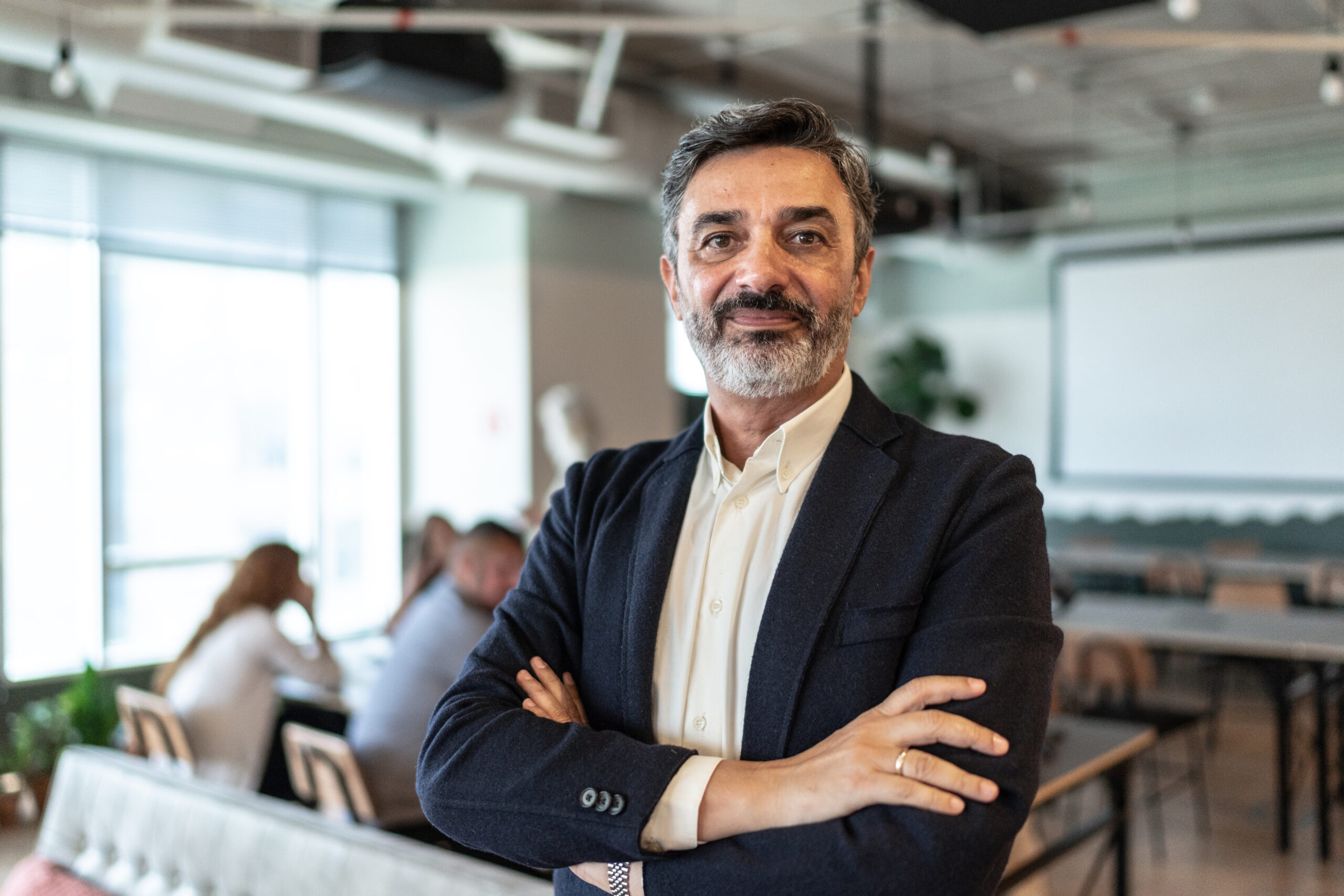 Portrait of mature businessman at modern office