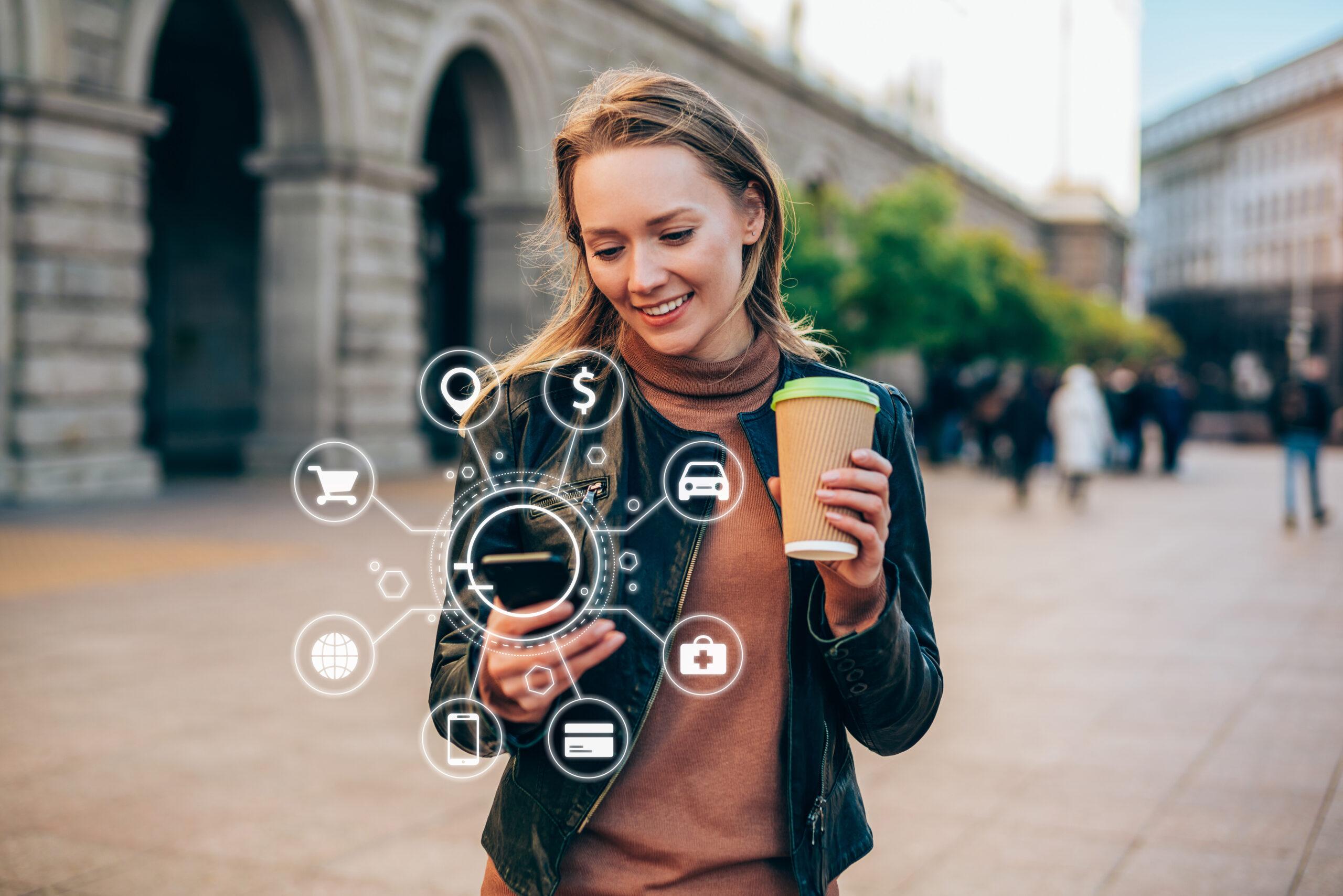 girl with coffee browsing smart internet on mobile device