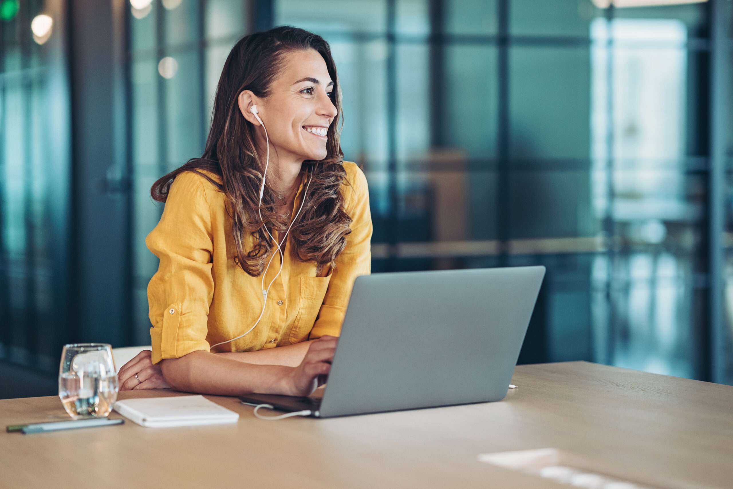 Portrait of a smiling businesswoman making a decision